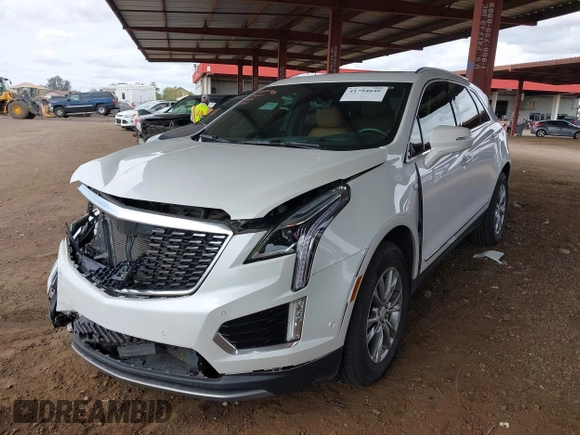 2021 Cadillac XT5 FWD Premium Luxury with VIN 1GYKNCRS5MZ224957, listed as a IAAI auction lot 41794648 with 28,540 mi miles and . Bid and sale history available at carsss.com. Image 2.