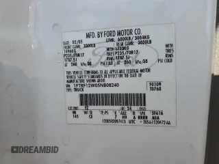2005 Ford F-150 XL with VIN 1FTRF12W05NB08240, listed as a Copart auction lot 42411995 with 333,955 mi miles and Salvage Title. Bid and sale history available at carsss.com. Image 12.