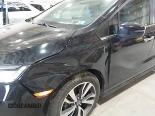 2021 Honda Odyssey Touring z VIN 5FNRL6H83MB028264, wystawiony jako IAAI lot #42206204 z przebiegiem 45 332 mil mil oraz . Historia ofert i sprzedaży dostępna na DreamBid. Obrazek 18.