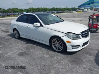 2014 Mercedes-Benz C 250 Sport with VIN WDDGF4HB0EA963191, listed as a IAAI auction lot 42411637 with 118,195 mi miles and . Bid and sale history available at DreamBid. Image 1.