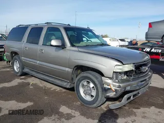2003 Chevrolet Suburban LT z VIN 3GNFK16Z23G236849, wystawiony jako IAAI lot #40980234 z przebiegiem 376 282 mil mil oraz . Historia ofert i sprzedaży dostępna na DreamBid. Obrazek 1.