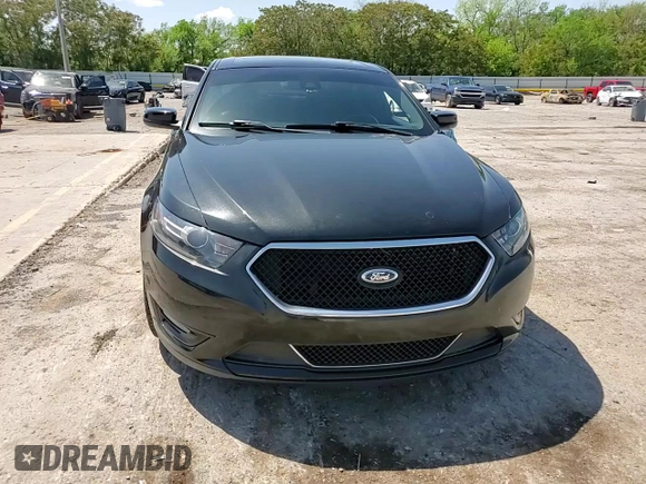 2013 Ford Taurus SHO z VIN 1FAHP2KT7DG133620, wystawiony jako Copart lot #54219005 z przebiegiem Nie podano mil oraz Szkoda całkowita • Salvage title. Historia ofert i sprzedaży dostępna na DreamBid. Obrazek 13.