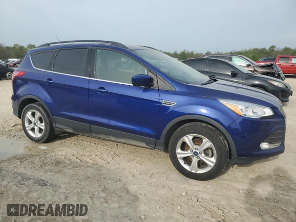 2015 Ford Escape SE with VIN 1FMCU0GX3FUB59712, listed as a Copart auction lot 53817045 with 100,580 mi miles and Salvage Title. Bid and sale history available at DreamBid. Image 4.