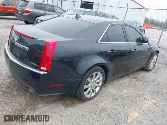 2009 Cadillac CTS AWD w/1SA with VIN 1G6DG577890126877, listed as a IAAI auction lot 42063927 with 117,444 mi miles. Bid and sale history available at carsss.com. Image 4.