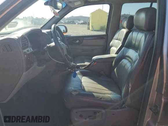 2002 GMC Envoy SLE z VIN 1GKDS13S822359901, wystawiony jako Copart lot #71940774 z przebiegiem 188 580 mil mil oraz Szkoda całkowita • Salvage title. Historia ofert i sprzedaży dostępna na DreamBid. Obrazek 7.