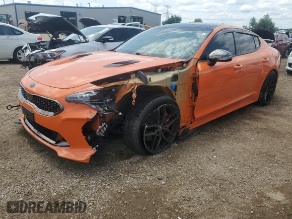 2021 Kia Stinger GT2 with VIN KNAE55LC6M6090748, listed as a Copart auction lot 63906114 with 23,195 mi miles and Salvage Title. Bid and sale history available at carsss.com. Image 1.