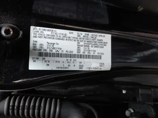 2014 Ford Focus Titanium with VIN 1FADP3J25EL310199, listed as a IAAI auction lot 40682901 with 84,885 mi miles and . Bid and sale history available at DreamBid. Image 9.