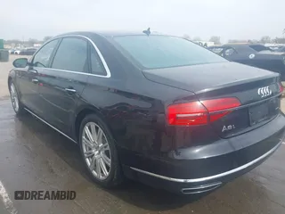 2015 Audi A8 3.0T with VIN WAU3GAFD7FN037726, listed as a IAAI auction lot 41793699 with 100,773 mi miles and . Bid and sale history available at DreamBid. Image 3.