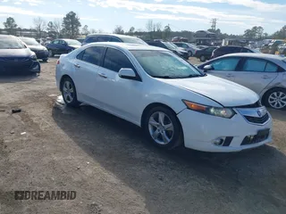 2012 Acura TSX with VIN JH4CU2F41CC022713, listed as a IAAI auction lot 41691558 with 124,616 mi miles. Bid and sale history available at carsss.com. Image 1.