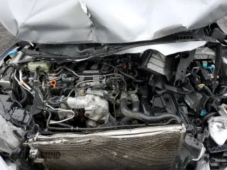 2017 Honda Civic EX-L z VIN 19XFC1F74HE209787, wystawiony jako Copart lot #56352415 z przebiegiem 130 264 mil mil oraz Szkoda całkowita • Salvage title. Historia ofert i sprzedaży dostępna na DreamBid. Obrazek 11.