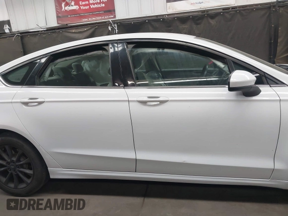 2017 Ford Fusion S with VIN 3FA6P0G72HR222095, listed as a IAAI auction lot 42151178 with 108,001 mi miles and . Bid and sale history available at DreamBid. Image 12.