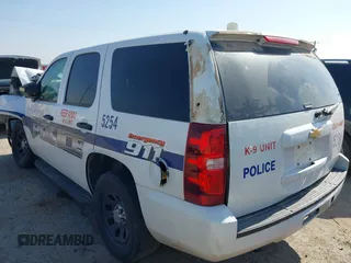 2012 Chevrolet Tahoe Commercial with VIN 1GNLC2E08CR285885, listed as a IAAI auction lot 42326129 with 100,035 mi miles and . Bid and sale history available at DreamBid. Image 3.