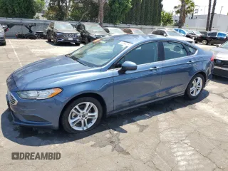 2018 Ford Fusion SE with VIN 3FA6P0HD1JR268219, listed as a Copart auction lot 59612485 with 69,315 mi miles and Clean title. Bid and sale history available at DreamBid. Image 1.