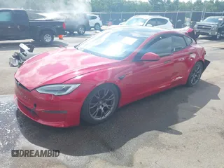 2021 Tesla Model S Plaid z VIN 5YJSA1E69MF439987, wystawiony jako IAAI lot #42496725 z przebiegiem 25 mil mil oraz . Historia ofert i sprzedaży dostępna na DreamBid. Obrazek 2.