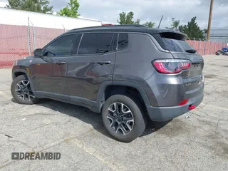 2021 Jeep Compass Trailhawk with VIN 3C4NJDDB6MT561074, listed as a IAAI auction lot 42125886 with 77,293 mi miles and . Bid and sale history available at DreamBid. Image 3.