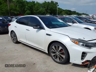 2016 Kia Optima SXL Turbo with VIN 5XXGV4L26GG015874, listed as a IAAI auction lot 42127366 with 166,970 mi miles. Bid and sale history available at carsss.com. Image 13.