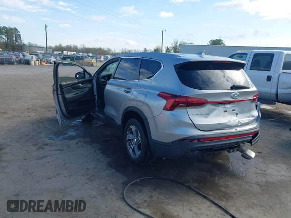 2021 Hyundai Santa Fe SE with VIN 5NMS14AJ4MH309691, listed as a IAAI auction lot 41897874 with 38,799 mi miles. Bid and sale history available at carsss.com. Image 3.