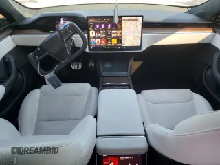 2023 Tesla Model S with VIN 5YJSA1E57PF498760, listed as a Copart auction lot 88494905 with 39,521 mi miles and Salvage title. Bid and sale history available at DreamBid. Image 8.