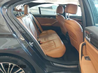 2018 BMW 5 Series 530i xDrive with VIN WBAJA7C55JWA73459, listed as a IAAI auction lot 41634921 with 64,759 mi miles and . Bid and sale history available at carsss.com. Image 8.