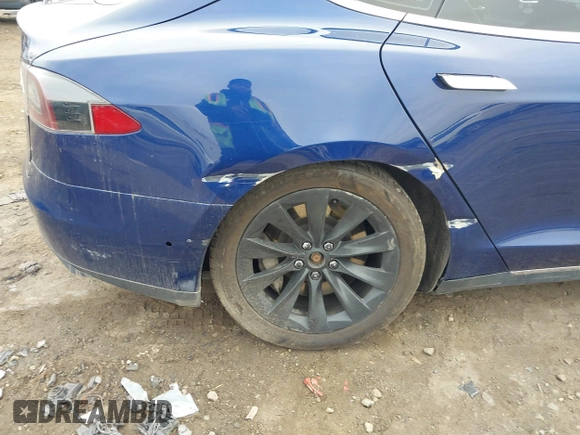 2016 Tesla Model S 90D with VIN 5YJSA1E21GF128362, listed as a IAAI auction lot 40891999 with 179,155 mi miles and . Bid and sale history available at DreamBid. Image 6.