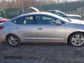 2020 Hyundai Elantra SEL z VIN 5NPD84LF6LH547993, wystawiony jako IAAI lot #41036804 z przebiegiem 72 360 mil mil oraz . Historia ofert i sprzedaży dostępna na DreamBid. Obrazek 14.