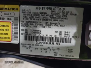 2013 Ford Fusion Titanium Hybrid with VIN 3FA6P0RU4DR281789, listed as a IAAI auction lot 41909115 with 161,008 mi miles and . Bid and sale history available at DreamBid. Image 9.
