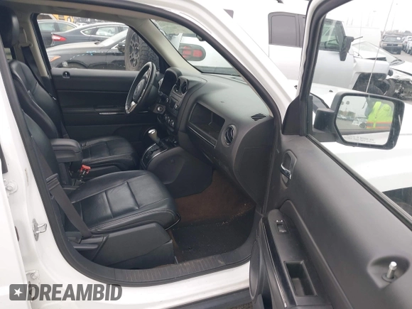 2014 Jeep Patriot Limited with VIN 1C4NJPCB2ED694389, listed as a IAAI auction lot 42028445 with 128,343 mi miles and . Bid and sale history available at DreamBid. Image 5.