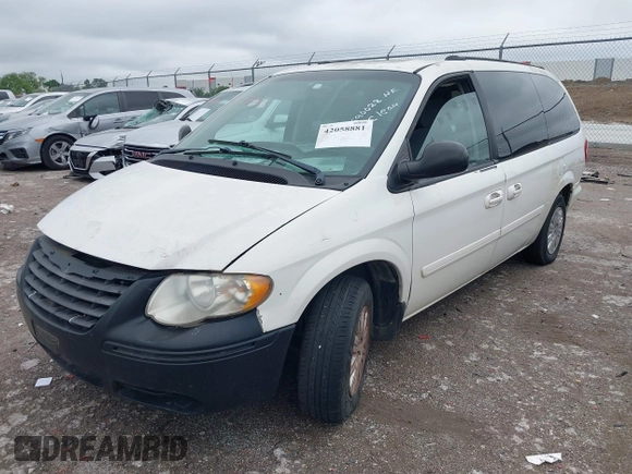 2005 Chrysler Town & Country LX with VIN 2C4GP44RX5R590022, listed as a IAAI auction lot 42058881 with 191,272 mi miles and . Bid and sale history available at DreamBid. Image 2.
