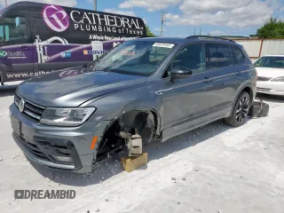 2021 Volkswagen Tiguan SE z VIN 3VV3B7AX4MM133120, wystawiony jako Copart lot #59979165 z przebiegiem 55 902 mil mil oraz Szkoda całkowita • Salvage title. Historia ofert i sprzedaży dostępna na DreamBid. Obrazek 1.