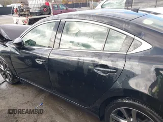 2016 Mazda 6 i Grand Touring with VIN JM1GJ1W54G1454115, listed as a IAAI auction lot 41203298 with 104,632 mi miles and . Bid and sale history available at DreamBid. Image 15.