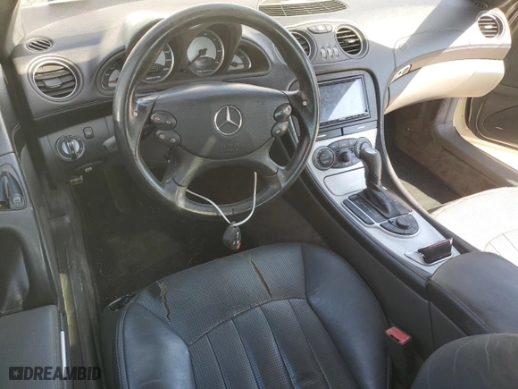 2005 Mercedes-Benz SL-Class 5.5L AMG with VIN WDBSK74F35F101434, listed as a Copart auction lot 77668344 with 94,471 mi miles and Salvage Title. Bid and sale history available at carsss.com. Image 8.