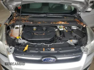 2014 Ford Escape SE z VIN 1FMCU9G97EUC43696, wystawiony jako Copart lot #57409665 z przebiegiem 68 586 mil mil oraz Czysty tytuł • Clean title. Historia ofert i sprzedaży dostępna na DreamBid. Obrazek 11.