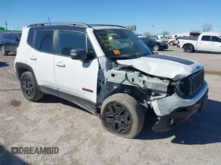 2018 Jeep Renegade Trailhawk with VIN ZACCJBCB1JPH28490, listed as a IAAI auction lot 41406910 with 76,003 mi miles. Bid and sale history available at carsss.com. Image 1.