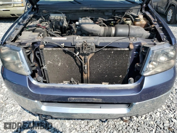 2005 Ford F-150 XL с VIN 1FTRW14W05FB72012, выставлен на аукционе Copart как лот 60757395 с пробегом 265 168 миль миль и Чистый • Clean title. История ставок и продаж доступна на DreamBid. Изображение 11.