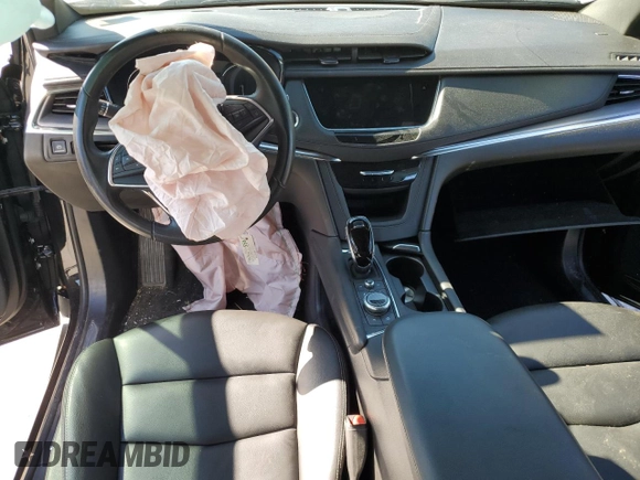 2022 Cadillac XT5 FWD Luxury with VIN 1GYKNAR45NZ118872, listed as a Copart auction lot 79676544 with 31,467 mi miles and Salvage title. Bid and sale history available at DreamBid. Image 8.