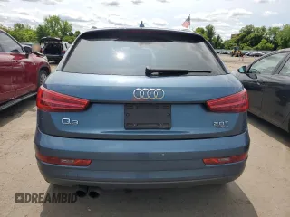 2018 Audi Q3 Premium z VIN WA1ECCFS8JR009981, wystawiony jako Copart lot #58785255 z przebiegiem 85 586 mil mil oraz Szkody całkowita. Historia ofert i sprzedaży dostępna na DreamBid. Obrazek 6.