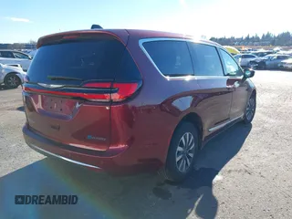 2023 Chrysler Pacifica Hybrid Limited with VIN 2C4RC1S7XPR518695, listed as a IAAI auction lot 41301401 with 24,433 mi miles and . Bid and sale history available at DreamBid. Image 4.