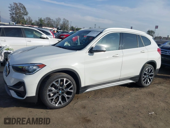 2022 BMW X1 sDrive28i with VIN WBXJG7C05N5U58988, listed as a IAAI auction lot 41466393 with 56,062 mi miles. Bid and sale history available at carsss.com. Image 14.