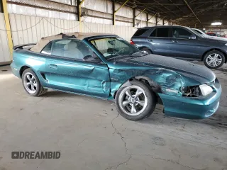 1996 Ford Mustang GT with VIN 1FALP45X5TF226385, listed as a Copart auction lot 43082185 with 21,450 mi miles and Salvage Title. Bid and sale history available at carsss.com. Image 4.