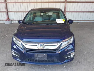 2020 Honda Odyssey Touring with VIN 5FNRL6H82LB015715, listed as a IAAI auction lot 41915849 with 69,603 mi miles and . Bid and sale history available at DreamBid. Image 13.