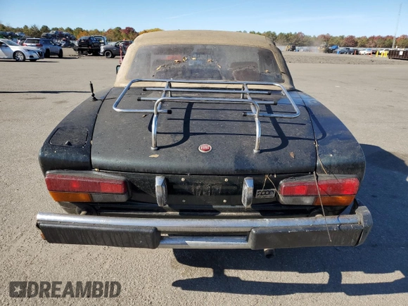 1979 FIAT 124 Spider z VIN 124CS20151060, wystawiony jako Copart lot #78019714 z przebiegiem 95 504 mil mil oraz Czysty tytuł • Clean title. Historia ofert i sprzedaży dostępna na DreamBid. Obrazek 6.