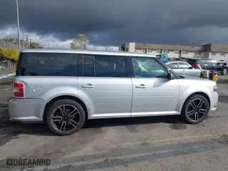 2014 Ford Flex SEL with VIN 2FMGK5C84EBD02738, listed as a IAAI auction lot 41712816 with 217,646 mi miles. Bid and sale history available at carsss.com. Image 12.