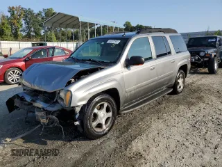 2005 Chevrolet TrailBlazer LS with VIN 1GNET16S656137810, listed as a Copart auction lot 69522694 with 126,768 mi miles and Salvage Title. Bid and sale history available at DreamBid. Image 1.