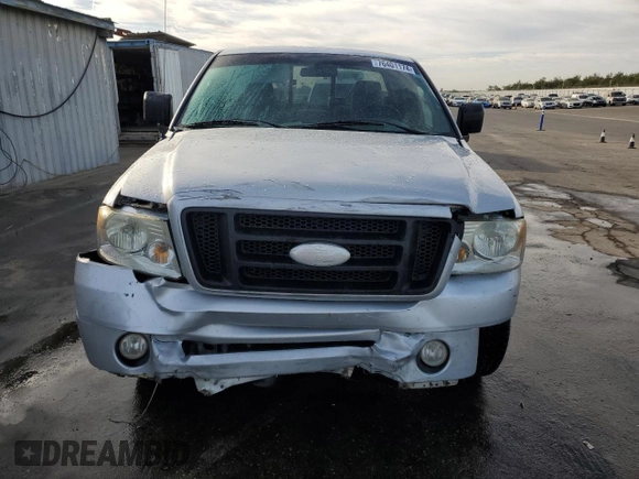 2006 Ford F-150 STX with VIN 1FTRF02W46KA92833, listed as a Copart auction lot 76401174 with 132,603 mi miles and Salvage Title. Bid and sale history available at carsss.com. Image 5.