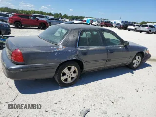 2004 Ford Crown Victoria LX z VIN 2FAFP74W44X112942, wystawiony jako Copart lot #50484665 z przebiegiem 248 480 mil mil oraz Szkoda całkowita • Salvage title. Historia ofert i sprzedaży dostępna na DreamBid. Obrazek 3.
