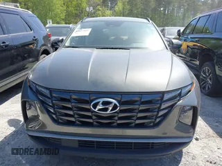 2022 Hyundai Tucson SEL with VIN 5NMJB3AEXNH144592, listed as a IAAI auction lot 42037487 with 75,651 mi miles and . Bid and sale history available at DreamBid. Image 12.