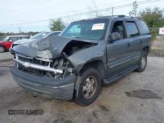 2002 Chevrolet Tahoe LS with VIN 1GNEC13VX2R156255, listed as a IAAI auction lot 41376768 with 246,305 mi miles. Bid and sale history available at carsss.com. Image 18.