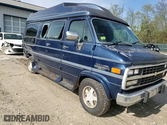 1995 Chevrolet Chevy Van z VIN 1GBEG25K1SF242663, wystawiony jako Copart lot #56105615 z przebiegiem 140 366 mil mil oraz Czysty tytuł • Clean title. Historia ofert i sprzedaży dostępna na DreamBid. Obrazek 14.