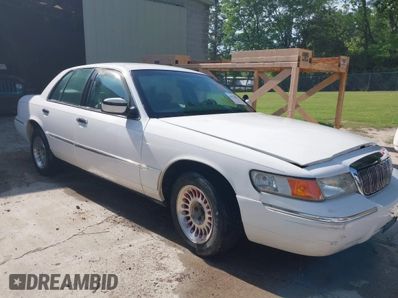 2002 Mercury Grand Marquis LS Premium with VIN 2MEFM75W82X642134, listed as a IAAI auction lot 42134033 with 252,295 mi miles and . Bid and sale history available at DreamBid. Image 1.
