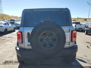 2023 Ford Bronco z VIN 1FMDE5CP7PLB26062, wystawiony jako Copart lot #76208154 z przebiegiem 17 688 mil mil oraz Szkoda całkowita • Salvage title. Historia ofert i sprzedaży dostępna na DreamBid. Obrazek 6.